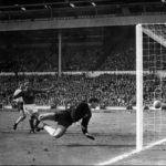 
              FILE - A shot from England's Geoff Hurst, not in photo, bounces down from the West Germany crossbar during the World Cup final at London's Wembley Stadium on July 30, 1966. The linesman gave it as a goal and England went to to win 4-2. (AP Photo/File)
            