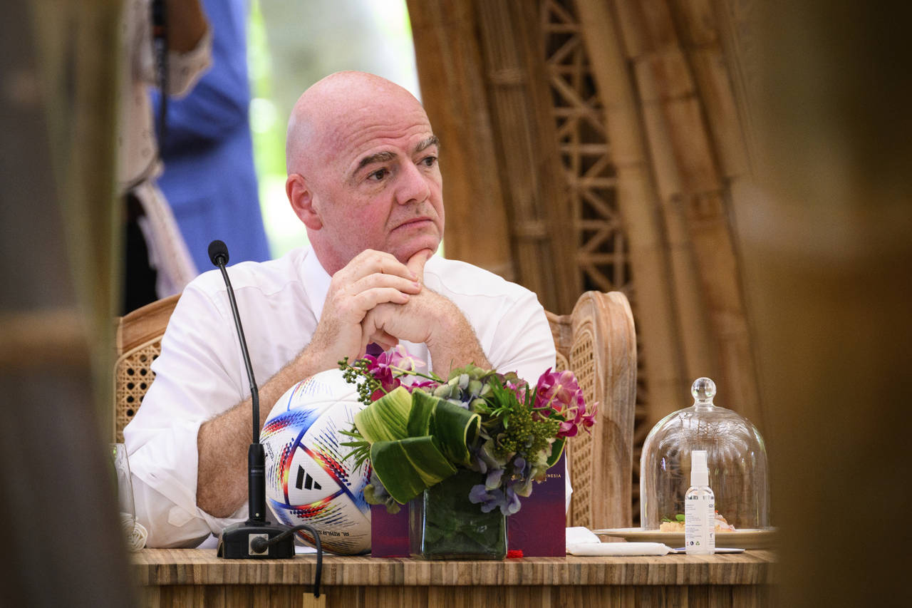 FIFA President Gianni Infantino waits ahead of a working lunch at the G20 Summit in Nusa Dua, Bali,...