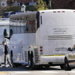 
              Police investigators work around a bus which is believed to be the site of an overnight shooting on the grounds of the University of Virginia Monday, Nov. 14, 2022, in Charlottesville. Va. Authorities say three people have been killed and two others were wounded in a shooting at the University of Virginia and a student suspect is in custody. (AP Photo/Steve Helber)
            
