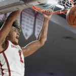 
              Oklahoma forward Jalen Hill (1) dunks in the second half of an NCAA college basketball game against UNC Wilmington, Tuesday, Nov. 15, 2022, in Norman, Okla. (AP Photo/Sue Ogrocki)
            