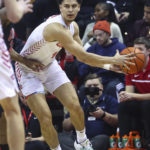 
              Dayton guard Koby Brea (4) looks to pass the ball during the first half of an NCAA college basketball game against UNLV Tuesday, Nov. 15, 2022, in Las Vegas. (AP Photo/Chase Stevens)
            