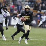 
              Purdue quarterback Aidan O'Connell (16) scrambles against Northwestern during the second half of an NCAA college football game in West Lafayette, Ind., Saturday, Nov. 19, 2022. Purdue defeated Northwestern 17-9. (AP Photo/Michael Conroy)
            