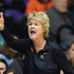 
              Iowa head coach Lisa Bluder shouts to her team during the first half of an NCAA college basketball game against Oregon State in the Phil Knight Legacy tournament Friday, Nov. 25, 2022, in Portland, Ore. (AP Photo/Rick Bowmer)
            