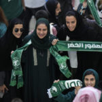 
              FILE - Saudi women supporters celebrate after Saudi Arabia won the World Cup group C soccer match between Argentina and Saudi Arabia at the Lusail Stadium in Lusail, Qatar, on Nov. 22, 2022. For a brief moment after Saudi Arabia's Salem Aldawsari fired a soccer ball from just inside the penalty box into the back of the net to seal a win against Argentina, Arabs across the divided Middle East found something to celebrate. (AP Photo/Luca Bruno, File)
            