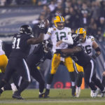 
              Green Bay Packers quarterback Aaron Rodgers (12) is hit during the second half of an NFL football game against the Philadelphia Eagles, Sunday, Nov. 27, 2022, in Philadelphia. (AP Photo/Matt Rourke)
            
