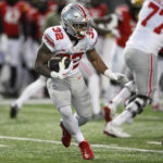 
              Ohio State running back TreVeyon Henderson (32) runs with the ball during the first half of an NCAA college football game against Maryland, Saturday, Nov. 19, 2022, in College Park, Md. (AP Photo/Nick Wass)
            