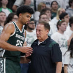
              Michigan State forward Malik Hall (25) talks with head coach Tom Izzo during the second half of an NCAA college exhibition basketball game, Tuesday, Nov. 1, 2022, in East Lansing, Mich. (AP Photo/Carlos Osorio)
            