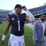 
              Chicago Bears quarterback Justin Fields walks off the field after the Miami Dolphins beat the Bears 35-32 in an NFL football game, Sunday, Nov. 6, 2022 in Chicago. (AP Photo/Nam Y. Huh)
            