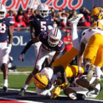 
              Arizona State wide receiver Elijhah Badger (2) scores a touchdown against Arizona in the first half of an NCAA college football game, Friday, Nov. 25, 2022, in Tucson, Ariz. (AP Photo/Rick Scuteri)
            