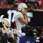 
              Los Angeles Chargers place kicker Cameron Dicker (15) celebrates after kicking a 37-yard field goal on the final play of an NFL football game against the Atlanta Falcons, Sunday, Nov. 6, 2022, in Atlanta. The Chargers won 20-17. (AP Photo/Butch Dill)
            