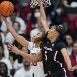 
              Stanford guard Haley Jones shoots the ball while defended by South Carolina forward Victaria Saxton (5) during the first half of an NCAA college basketball game in Stanford, Calif., Sunday, Nov. 20, 2022. (AP Photo/Godofredo A. Vásquez)
            