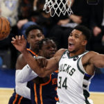 
              Milwaukee Bucks forward Giannis Antetokounmpo (34) reacts to being fouled by New York Knicks forward Julius Randle during the first half of an NBA basketball game Wednesday, Nov. 30, 2022, in New York. (AP Photo/Adam Hunger)
            