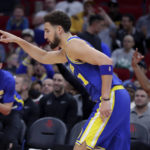
              Golden State Warriors guard Klay Thompson reacts after making a 3-point basket against the Houston Rockets during the first half of an NBA basketball game Sunday, Nov. 20, 2022, in Houston. (AP Photo/Michael Wyke)
            