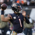 
              Chicago Bears quarterback Justin Fields (1) throws against the Detroit Lions during the first half of an NFL football game in Chicago, Sunday, Nov. 13, 2022. (AP Photo/Charles Rex Arbogast)
            