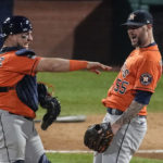 
              Houston Astros relief pitcher Ryan Pressly and catcher Christian Vazquez celebrate the Astros' win in Game 4 of baseball's World Series between the Houston Astros and the Philadelphia Phillies on Wednesday, Nov. 2, 2022, in Philadelphia. The Astros won 5-0 with a combined no-hitter to tie the series two games all. (AP Photo/Matt Rourke)
            