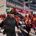 
              Iowa State head coach Matt Campbell runs onto the field before an NCAA college football game against West Virginia, Saturday, Nov. 5, 2022, in Ames, Iowa. College athletic programs of all sizes are reacting to inflation the same way as everyone else. They're looking for ways to save. Travel and food are the primary areas with increased costs. (AP Photo/Charlie Neibergall)
            