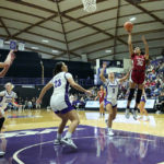 
              Stanford guard Haley Jones (30) scores a basket against Portland guard McKelle Meek (1) during the second half of an NCAA college basketball game in Portland, Ore., Sunday, Nov. 13, 2022. Stanford won the game 87-47. (AP Photo/Troy Wayrynen)
            