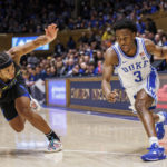 
              Duke's Jeremy Roach (3) handles the ball as Delaware's Jameer Nelson Jr., left, defends during the second half of an NCAA college basketball game in Durham, N.C., Friday, Nov. 18, 2022. (AP Photo/Ben McKeown)
            