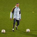 
              Spain's national soccer team coach Luis Enrique kicks a ball during a training session in Las Rozas, just outside Madrid, Spain, Monday, Nov. 14, 2022. The team will travel to Jordan for a friendly match on Thursday and then onto Qatar to participate in the World Cup. (AP Photo/Paul White)
            