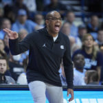 
              North Carolina head coach Hubert Davis gestures during the first half of an NCAA college basketball game against Iowa State in the Phil Knight Invitational tournament in Portland, Ore., Friday, Nov. 25, 2022. (AP Photo/Craig Mitchelldyer)
            