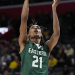
              Eastern Michigan forward Emoni Bates dunks during the first half of an NCAA college basketball game against Michigan, Friday, Nov. 11, 2022, in Detroit. (AP Photo/Carlos Osorio)
            