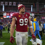 
              Arizona Cardinals defensive end J.J. Watt (99) walks off the field after an NFL football game against the Los Angeles Chargers, Sunday, Nov. 27, 2022, in Glendale, Ariz. The Chargers defeated the Cardinals 25-24. (AP Photo/Rick Scuteri)
            