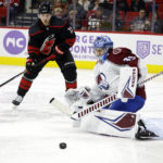 
              Carolina Hurricanes' Jesper Fast (71) has his shot bounce off Colorado Avalanche goaltender Pavel Francouz (39) during the second period of an NHL hockey game in Raleigh, N.C., Thursday, Nov. 17, 2022. (AP Photo/Karl B DeBlaker)
            