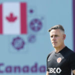 
              Canada head coach John Herdman watches his team during practice at the World Cup soccer tournament in Doha, Qatar Monday, Nov. 28, 2022. (Nathan Denette/The Canadian Press via AP)
            