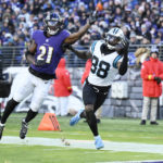 
              Carolina Panthers wide receiver Terrace Marshall Jr. (88) just misses a pass as Baltimore Ravens cornerback Brandon Stephens (21) defends in the second half of an NFL football game Sunday, Nov. 20, 2022, in Baltimore. (AP Photo/Nick Wass)
            