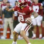 
              Oklahoma quarterback Dillon Gabriel passes the ball against Baylor in the second half of an NCAA college football game, Saturday, Nov. 5, 2022, in Norman, Okla. (AP Photo/Nate Billings)
            