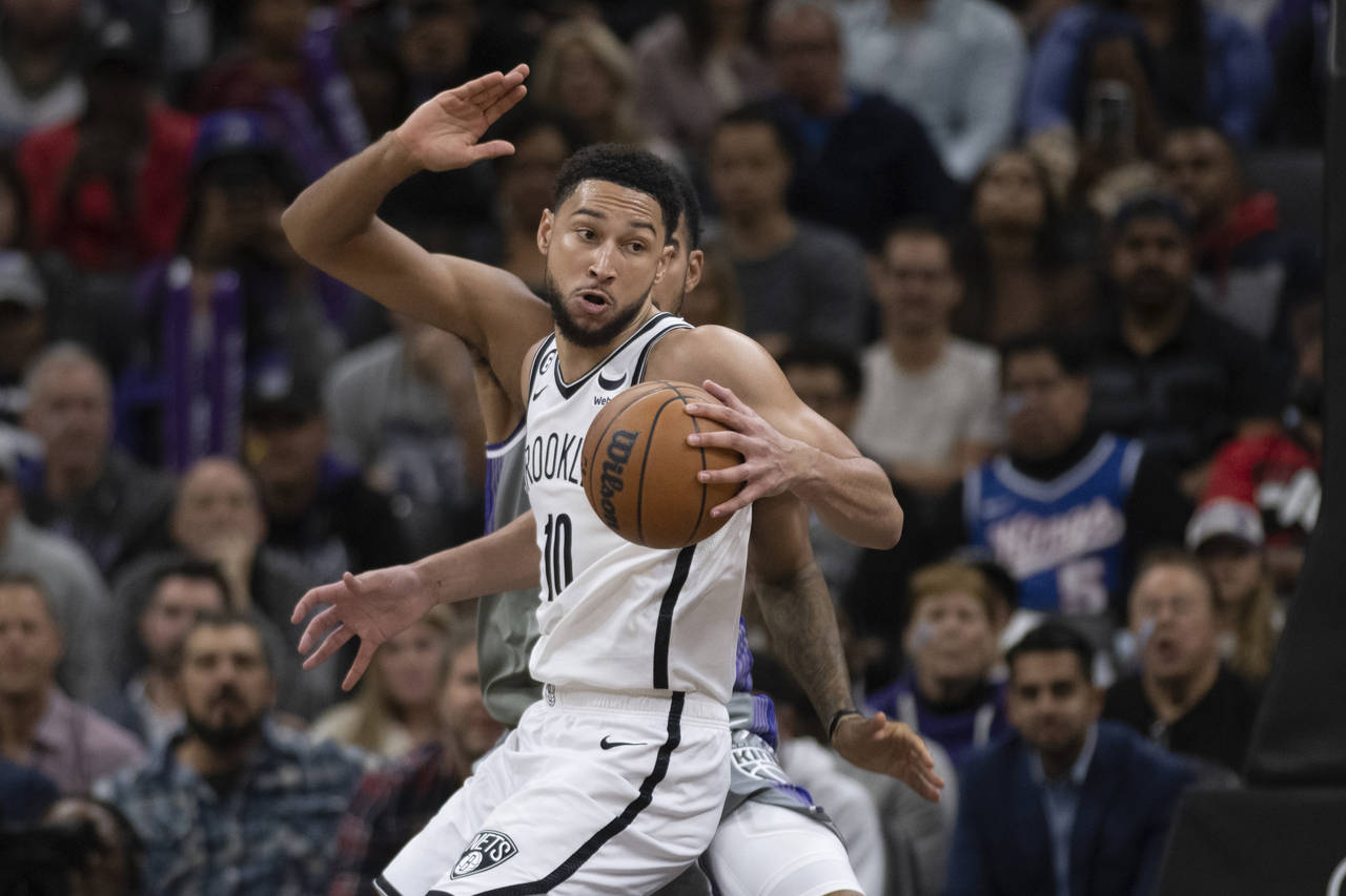 Brooklyn Nets guard Ben Simmons (10) makes a spin move in the key in the second half of an NBA bask...
