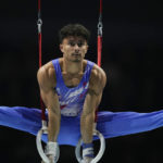 
              Jake Jarman of Britain competes on the rings at the Men's All-Around Final during the Artistic Gymnastics World Championships at M&S Bank Arena in Liverpool, England, Friday, Nov. 4, 2022. (AP Photo/Thanassis Stavrakis)
            