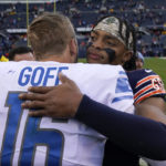 
              Detroit Lions quarterback Jared Goff (16) talks with Chicago Bears quarterback Justin Fields after an NFL football game in Chicago, Sunday, Nov. 13, 2022. (AP Photo/Charles Rex Arbogast)
            