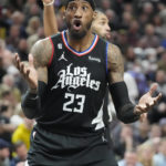 
              Los Angeles Clippers forward Robert Covington (23) reacts to a call during the first half of an NBA basketball game against the Utah Jazz Wednesday, Nov. 30, 2022, in Salt Lake City. (AP Photo/Rick Bowmer)
            
