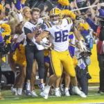 
              LSU tight end Mason Taylor runs to score a 2-point conversion in overtime against Alabama in an NCAA college football game in Baton Rouge, La., Saturday, Nov. 5, 2022. LSU won 32-31 in overtime. (Scott Clause/The Daily Advertiser via AP)
            