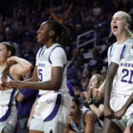 
              Kansas State players celebrate after a basket during the second half of an NCAA college basketball game against Iowa Thursday, Nov. 17, 2022, in Manhattan, Kan. Kansas State won 84-83. (AP Photo/Charlie Riedel)
            