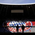 
              Workers prepare the FC Bayern Munich soccer stadium Allianz Arena in Munich, Germany, Wednesday, Nov. 9, 2022. The Tampa Bay Buccaneers are set to play the Seattle Seahawks in an NFL game at the Allianz Arena in Munich on Sunday. (AP Photo/Matthias Schrader)
            