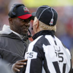 
              Tampa Bay Buccaneers coach Todd Bowles, left, talks with line judge Mark Stewart during the second half of the team's NFL football game against the Cleveland Browns in Cleveland, Sunday, Nov. 27, 2022. (AP Photo/Ron Schwane)
            