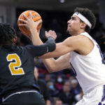 
              Northwestern forward Tydus Verhoeven, front right, shoots against Purdue Fort Wayne guard Damian Chong Qui (2) during the second half of an NCAA college basketball game in Evanston, Ill., Friday, Nov. 18, 2022. (AP Photo/Nam Y. Huh)
            