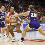 
              Ohio State's Cotie McMahon, center, dribbles between North Alabama's Skyler Gill, left, and Olivia Jones during the second half of an NCAA college basketball game on Sunday, Nov. 27, 2022, in Columbus, Ohio. (AP Photo/Jay LaPrete)
            