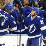 
              Tampa Bay Lightning center Brayden Point (21) celebrates with the bench after his goal against the St. Louis Blues during the first period of an NHL hockey game Friday, Nov. 25, 2022, in Tampa, Fla. (AP Photo/Chris O'Meara)
            