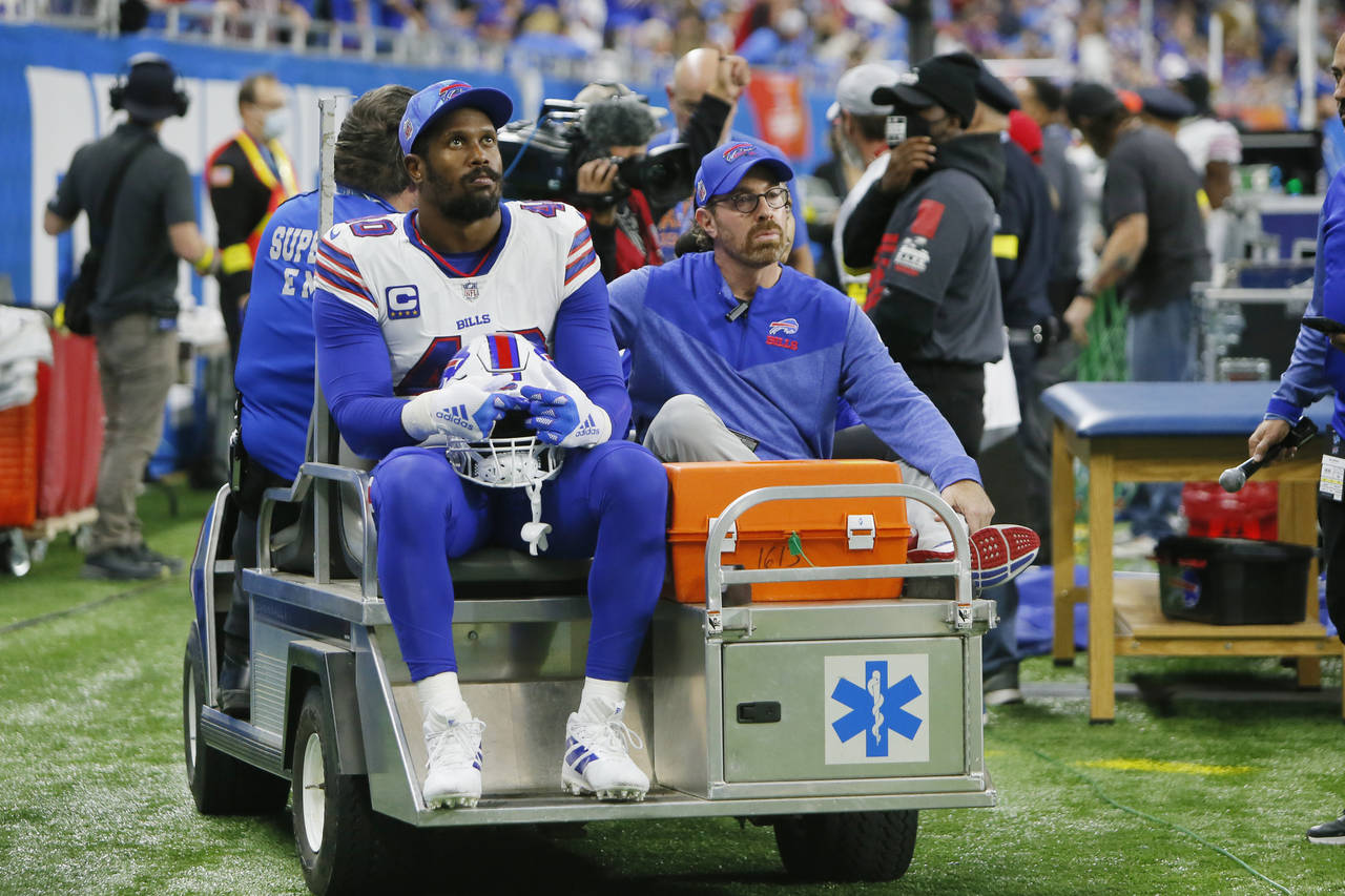 Buffalo Bills linebacker Von Miller (40) is carted off the field during the first half of an NFL fo...