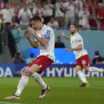 
              Poland's Robert Lewandowski reacts after missing a penalty during the World Cup group C soccer match between Mexico and Poland, at the Stadium 974 in Doha, Qatar, Tuesday, Nov. 22, 2022. (AP Photo/Aijaz Rahi)
            
