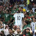 
              An Argentine fan cheers for Lionel Messi at the start of the World Cup group C soccer match between Argentina and Mexico, at the Lusail Stadium in Lusail, Qatar, Saturday, Nov. 26, 2022. (AP Photo/Hassan Ammar)
            