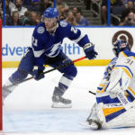 
              Tampa Bay Lightning center Brayden Point (21) scores past Buffalo Sabres goaltender Eric Comrie (31) during the second period of an NHL hockey game Saturday, Nov. 5, 2022, in Tampa, Fla. (AP Photo/Chris O'Meara)
            