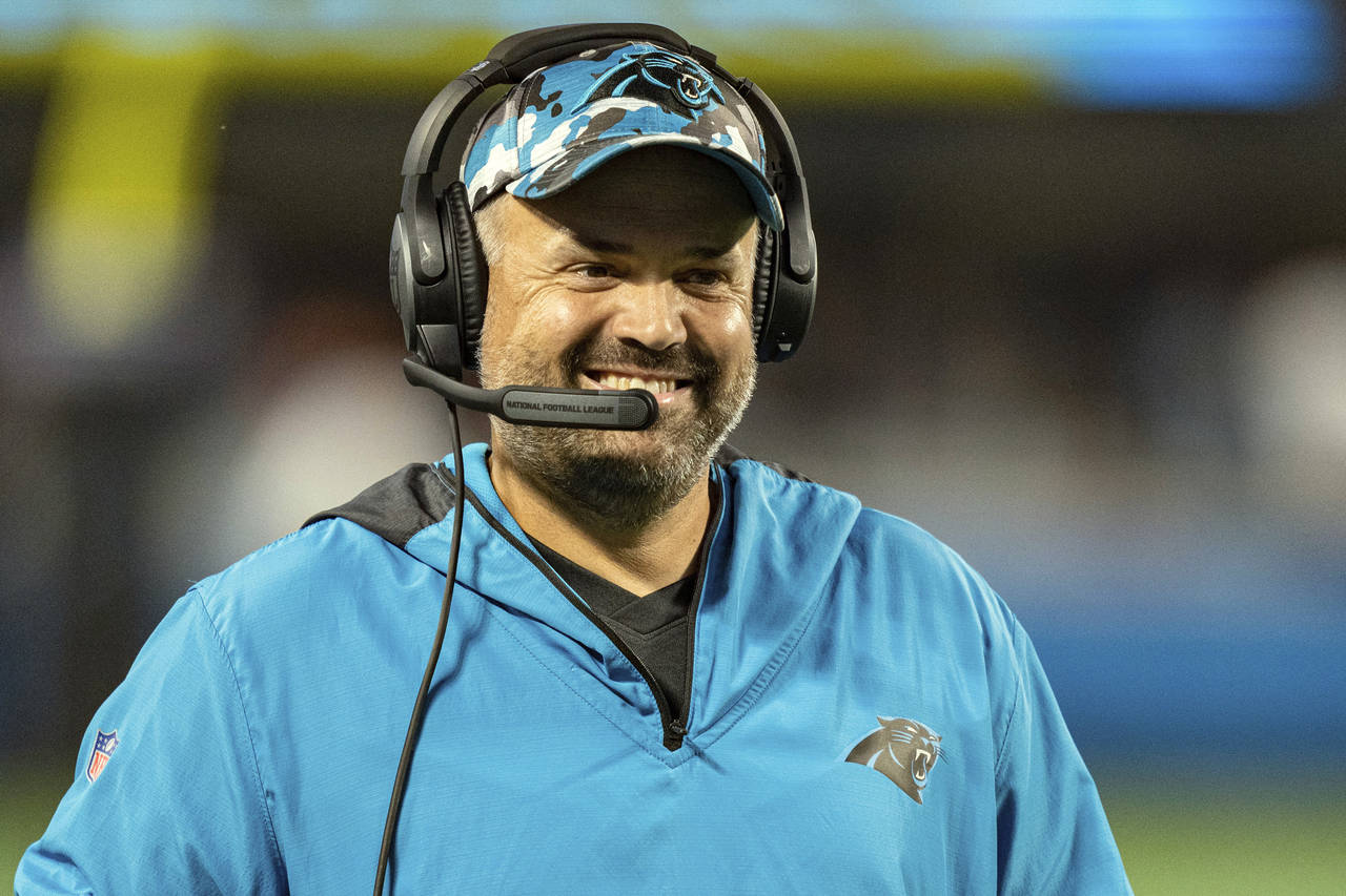 FILE - Carolina Panthers head coach Matt Rhule looks on during an NFL preseason football game again...