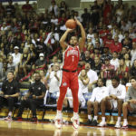 
              Ohio State guard Roddy Gayle Jr. (1) attempts a 3 point shot over San Diego State during the first half of an NCAA college basketball game, Monday, Nov. 21, 2022, in Lahaina, Hawaii. (AP Photo/Marco Garcia)
            