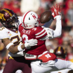 
              Nebraska's Trey Palmer (3) reaches for a pass as Minnesota's Jordan Howden (23) defends during the first half of an NCAA college football game Saturday, Nov. 5, 2022, in Lincoln, Neb. (AP Photo/Rebecca S. Gratz)
            