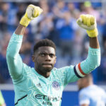 
              New York City goalkeeper Sean Johnson celebrates his team's victory over the CF Montreal in the Eastern Conference semifinals soccer game in Montreal, Sunday, Oct. 23, 2022. (Paul Chiasson/The Canadian Press via AP)
            