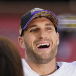 
              Minnesota Vikings quarterback Kirk Cousins (8) laughs during as interview on the field at the end of an NFL football game against the Washington Commanders , Sunday, Nov. 6, 2022, in Landover, Md. Vikings won the game 20-17. (AP Photo/Julio Cortez)
            
